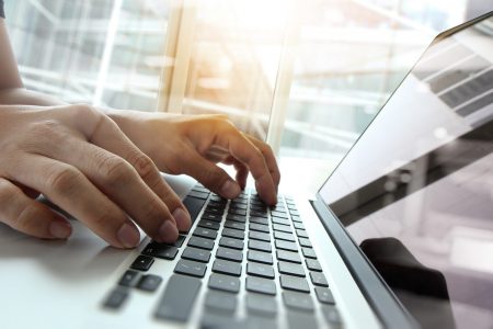 Double,Exposure,Of,Business,Man,Hand,Working,On,Blank,Screen