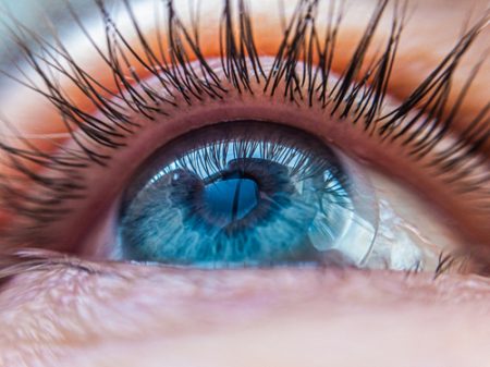 Caucasian,Human,Blue,Eye,In,A,Contact,Lens,Looking,Up